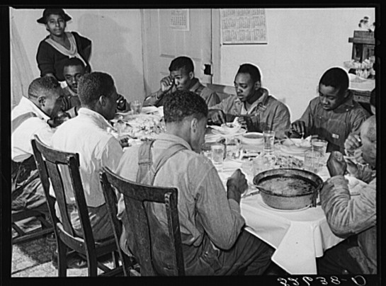 Marion Post Wolcott photographs the black men at the table with the same respect she gave the white men in the earlier picture.